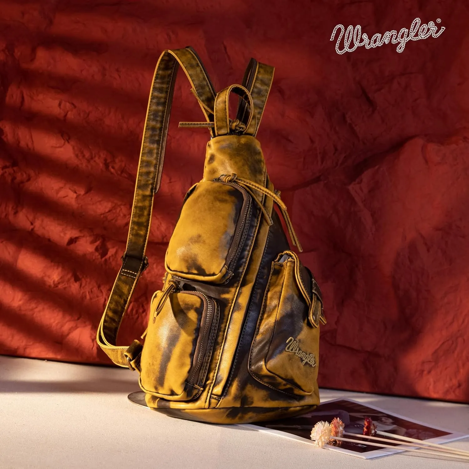 Wrangler Men's Sling Backpack Purse Crossbody Shoulder Bag with Adjustable Strap Vegan Leather Crossbody Bags for Men Women